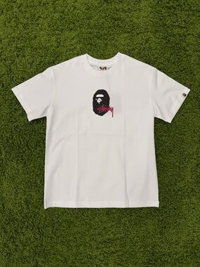 Stussy White Tee with Black Ape Graphic and Pink Logo